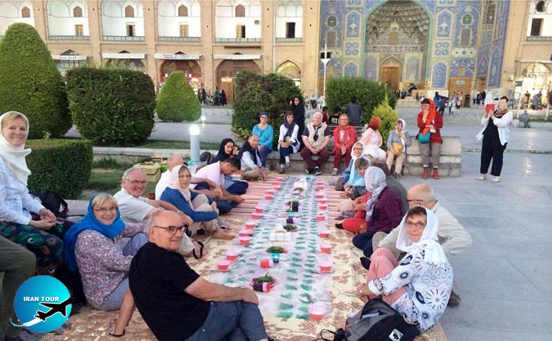 Tourists in Isfahan at ramadan month and iftar Sofre